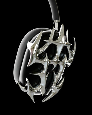 A protective case for AirPods Max headphones featuring a metallic, spiked design.